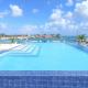 Stylish luxury condo, central location, ocean view, pool, gym Oranjestad - Foto 1