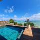 Luxury beachfront villa with private pool - Jolly's Rock, Calodyne