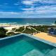 Casa Oceano Praia do Rosa, apartamentos pé na areia, Praia do Rosa, プライア・ド・ローザ - 写真 1
