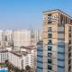 basePLUS-Shanghai BINJIANG Serviced Apartment, Shanghai - Foto 1