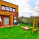Comfortable holiday home with a private garden Sarbinowo - Foto 1