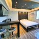 Burgundy McKinley Place Service Apartment, Manila - Fotografie 8
