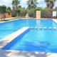 Beautiful 3 Bed Townhouse with landscaped communal pool area