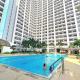 Stunning 1BR Balcony Pool view W/ Wi-Fi Grace Res, Manila - Fotografie 9