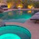Luxury Villa, with bonus pool house, Private Pool, Hot tub, rock water fall and slide, putting green, basketball, shuffle board, play gym, privately gated on circular driveway., Las Vegas - Photo 5