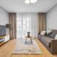 Ursus Comfy Apartment with FREE Parking by BookingHost, Varšava - Fotografie 1