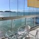 Apartamento vista do mar, pé na areia e águas tranquilas, no cento de Guarapari, ガラパリ - 写真 1
