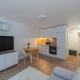 Convenient apartment with balcony by Polo Apartments, Kaunas