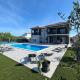 Modern Villa Freya with heated swimming pool, Murvica, Murvica