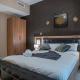 Darkwood Haven - Luxe 2BR Duplex Stay in Oasis, Near Masdar City Abu Dhabi - Photo 2