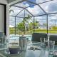 Pool overlooking canal, Outdoor Grilling station - Villa Sand Dollar Siesta Cape Coral - Zdjęcie 3