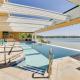 Beachfront Onekama Vacation Rental with Balcony!, Onekama