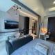 Elegant 1BR Uptown Parksuites BGC 200mbps/ Smart TV, Manila - Fotografie 1