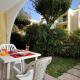 Flat with a lovely poolside garden with bbq Bibione - Foto 1