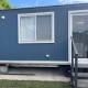 Sweet Cute blue tiny home with Pool and 2 minute drive to the beach