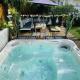 Évasion Tropicale - Villa d'Artiste avec Jacuzzi Privé dans un jardin Exotique, Mérignac (foto 3)