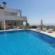 Luxury beachfront apartment with pool, sauna, fitness and gym in province Malaga, Andalusia