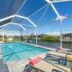 BRAND NEW - Pool overlooking canal, Outdoor Grilling station - Villa Hummingbird House - Roelens Cape Coral - Fotografie 1