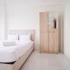 Best Choice 2BR at Puncak Dharmahusada Apartment Surabaya By Travelio, Surabaja (fotografie 3)