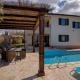 New villa with swimming pool, olive grove and sea view by Traveler tourist agency Krk ID 2201, Brzac