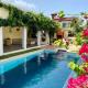 Modern 4BR Villa with Private Pool walk to Palm Beach, Palm-Eagle Beach