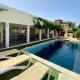 Modern 4BR Villa with Private Pool walk to Palm Beach, Palm-Eagle Beach (foto 6)