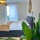 AMAO-Grey I 86qm I Modernes Apartment I 86qm I Balkon, Netflix I Parkplatz I Nähe Europa-Park, Rheinhausen - Kuva 3