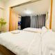 Thompson Suites - 2 beds, One Uptown Residences 28F A - XBOX & Netflix, Manila - Fotografie 2