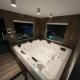 Casa agradável em frente a praia com jacuzzi/spa, ニテロイ - 写真 1