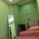 Nik Homestay Tanah Merah - Foto 6
