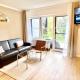 Snug Stays 2 - Design Studio am See mit Terrasse, Garten, Badestelle vor dem Haus, ヴェルトゼー - 写真 2