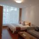 Changchun Clear Moon Apartment by South Lake Hotel, Čchang-čchun - Fotografie 7