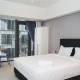 Simply Look Studio Apartment Carstensz Residence By Travelio, Kramat - Fotografie 1