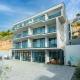 Seaside apartments with a swimming pool Brela, Makarska - 20229