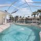 Waterfront home with pool table, heated pool and dock Marco Island - Photo 1