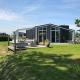 Chalet in Zeeland with Garden and Fireplace