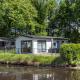 Chalet by the Pond with Modern Comfort De Bult - Photo 1