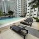 L&B Condo-Cozy and Peaceful 1 Bedroom near MOA with WIFI, NETFLIX and Parking, Manila - Fotografie 1