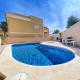 Pleasant 4 Bedroom Townhouse with Com Pool VM7