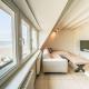 Apartment Koekoeksnest Penthouse at the beach by Interhome