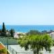 BnB Homes Ocean view Apartment with comfortable Terrace, 2 Swimming pools & Tennis court
