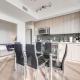 Epic 2BR Condo with Panoramic CN Tower & City View Toronto - Photo 10