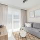 Gustowny Apartament z Parkingiem i Balkonem w Kolobrzegu by Noclegi Renters