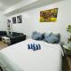 Vinia Infinity Studio 1 Near Malls with WiFi and Netflix, Manila - Fotografie 8