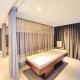 BGC Uptown Parksuites King Bed with Balcony Sunset and City View, Manila - Fotografie 4
