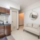 Modern Stylish Condo in Stamford McKinley Wi-Fi, Manila - Fotografie 4