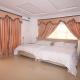 WHITE HOUSE B & B SERVICE APARTMENT, Ogba - Fotografie 2
