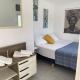 Popi's Apartment, Goníai (fotografie 6)