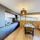 Appartement d'Exception 2 Chambres, 63 m², au Pied des Pistes, Parking Inclus, Wi-Fi - FR-1-560-142