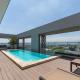 Modern Luxury Condo with Rooftop Pool & Gym